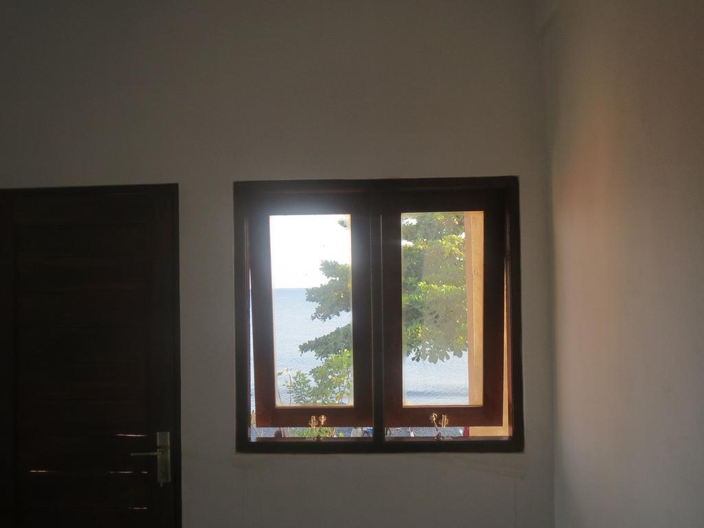 Amed Sari Beach Guesthouse Bilik gambar