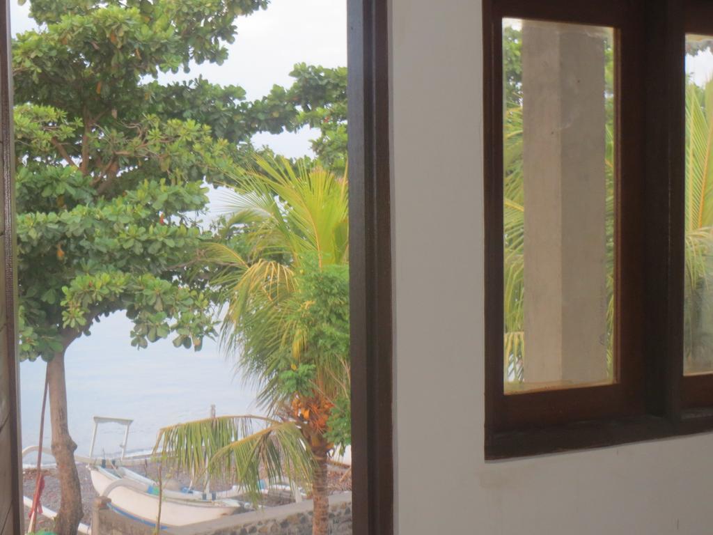 Amed Sari Beach Guesthouse Bilik gambar